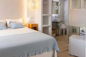Postel nebo postele na pokoji v ubytování B&B Mirazul