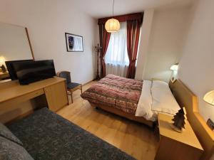 Postel nebo postele na pokoji v ubytování Garni B&B Mozart Nesthouse