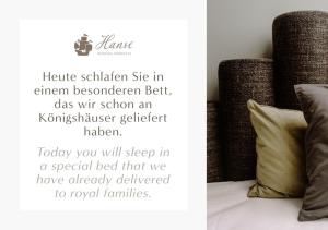 a picture of a bed with a pillow on it at Boardinghouse Luise 5 in Heidelberg