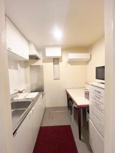 Kuchyň nebo kuchyňský kout v ubytování Hananosato Hotel 池袋本店