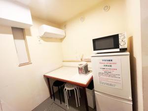Kuchyň nebo kuchyňský kout v ubytování Hananosato Hotel 池袋本店