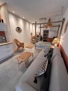 Posezení v ubytování Appartement Cosy Loft + 34 fotografií