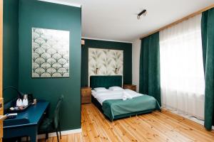 Posteľ alebo postele v izbe v ubytovaní Elegant Apartments