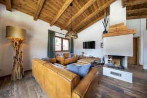 TV a/nebo společenská místnost v ubytování Nationalpark Chalet Kratzenberg