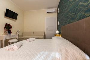 Postel nebo postele na pokoji v ubytování Amy Rooms