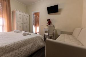 Postel nebo postele na pokoji v ubytování Amy Rooms