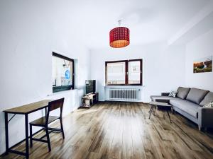 Гостиная зона в CityChalet Gruppen-Apartments