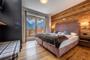 Posteľ alebo postele v izbe v ubytovaní Nationalpark Chalet Schwarzes Hörndl