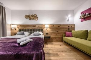 Posteľ alebo postele v izbe v ubytovaní Nationalpark Chalet Schwarzes Hörndl
