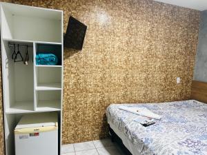 Postel nebo postele na pokoji v ubytování Ilha Bela Pousada