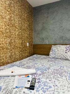 Postel nebo postele na pokoji v ubytování Ilha Bela Pousada