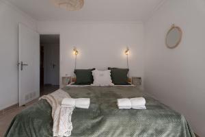 Postelja oz. postelje v sobi nastanitve Loft des Crêtes vue mer