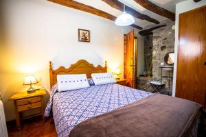 Postel nebo postele na pokoji v ubytování Casa Enduella