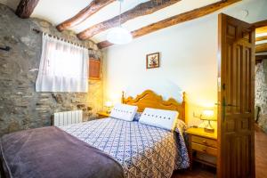 Postel nebo postele na pokoji v ubytování Casa Enduella