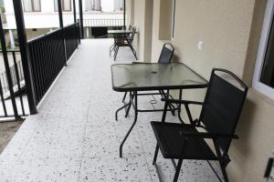 Balkón nebo terasa v ubytování Best Guesthouse + 19 fotografií