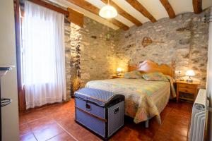 Postel nebo postele na pokoji v ubytování Casa Enduella