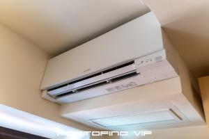 a ceiling mounted air conditioner in a room at Da I Gemelli Loft by PortofinoVip in Portofino