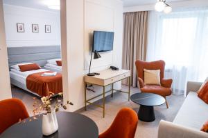 Ένα ή περισσότερα κρεβάτια σε δωμάτιο στο Ośrodek Szkoleniowo Wypoczynkowy Galicya