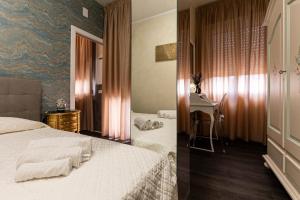Postel nebo postele na pokoji v ubytování Amy Rooms
