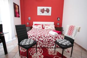 Katil atau katil-katil dalam bilik di Villa Regina Accommodation