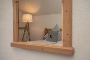 Postel nebo postele na pokoji v ubytování Hotel Gasthof Alter Wirt