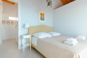 Postel nebo postele na pokoji v ubytování Villas Maher One