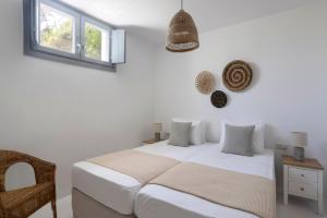 Posteľ alebo postele v izbe v ubytovaní Villa Fryni, private pool & seaview by Naxos Dunes + 29 fotografií
