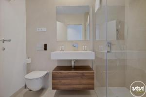 Ванная комната в ViVi Homes - Aura Pool, Sauna, Spa, Gym & Sea View