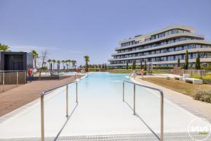 Бассейн в ViVi Homes - Aura Pool, Sauna, Spa, Gym & Sea View или поблизости