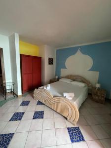 Postel nebo postele na pokoji v ubytování Anima Rooms & Pool