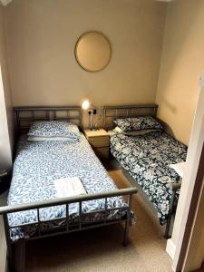 Voodi või voodid majutusasutuse Eilio Cottage- Closely located to Snowdon toas