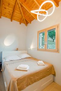 Postel nebo postele na pokoji v ubytování Villas Maher One