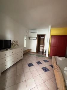 TV a/nebo společenská místnost v ubytování Anima Rooms & Pool