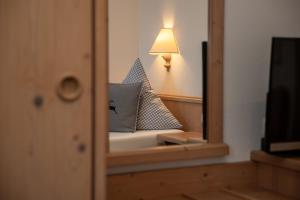 Postel nebo postele na pokoji v ubytování Hotel Gasthof Alter Wirt