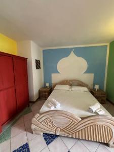 Postel nebo postele na pokoji v ubytování Anima Rooms & Pool