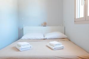 Postel nebo postele na pokoji v ubytování Villas Maher One