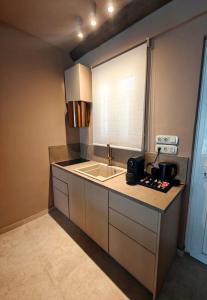 A kitchen or kitchenette at Locanda