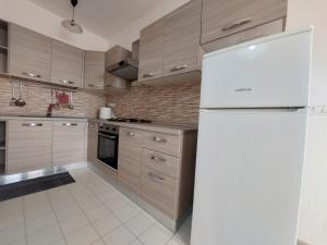Cucina o angolo cottura di Bellissimo attico a 70 mt dalla spiaggia