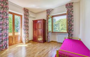 A bed or beds in a room at Villa Caterina