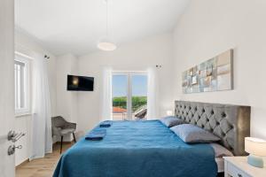 Ένα ή περισσότερα κρεβάτια σε δωμάτιο στο Villa Molinari +22 φωτογραφίες