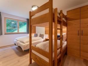 Postel nebo postele na pokoji v ubytování Appartement Schmittenblick Top 3