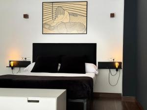 Cama o camas de una habitación en Loft Almagro