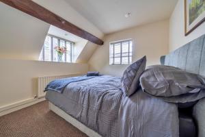 Katil atau katil-katil dalam bilik di Finest Retreats - Barn Cottage