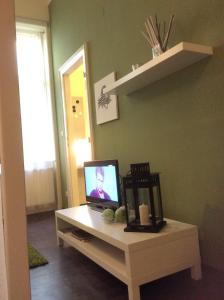 TV a/nebo společenská místnost v ubytování Apartment Ivory