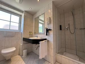 Koupelna v ubytování Hotel Gasthof Alter Wirt