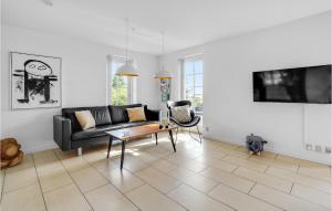 TV/trung tâm giải trí tại Holiday Home Vestergade Rømø Xi