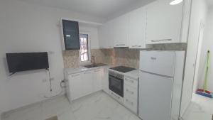 Kuchyň nebo kuchyňský kout v ubytování Komi's House + 1 fotografie