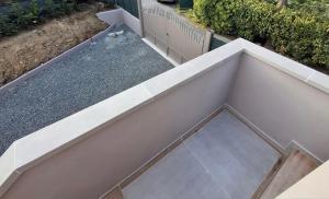 an overhead view of a patio with a concrete floor at Colori di Mare Luxury Holiday in Lerici +39 photos