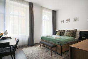 Posteľ alebo postele v izbe v ubytovaní CORU House