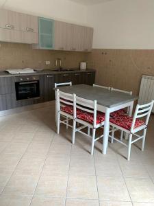 Kuchyň nebo kuchyňský kout v ubytování A Casa Mia 2 - Casa vacanze + 6 fotografií